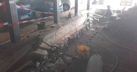 Reihenbohrungen Ø 300 mm durch 1,20m tiefes Fundament in Parkhaus Reihenbohrungen Ø 300 mm durch 1,20m tiefes Fundament in Parkhaus