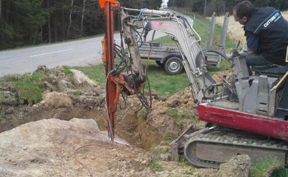 Minibagger mit Bohrlafette